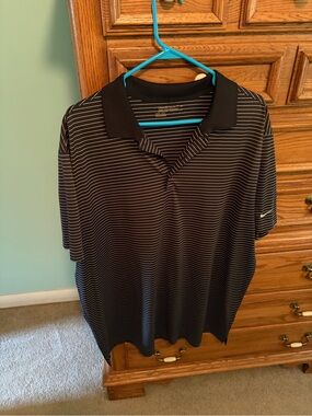 Nike Men's Black Polo with Thin White Stripes and Black Collar